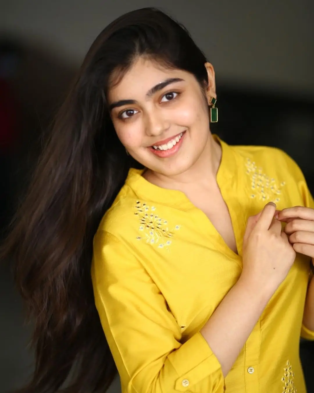 Gargeyi Yellapragada Smiling Face Long Hair Yellow Dress